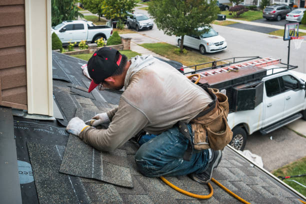 Professional Emergency Roof Repair technician working in Berkley, MA